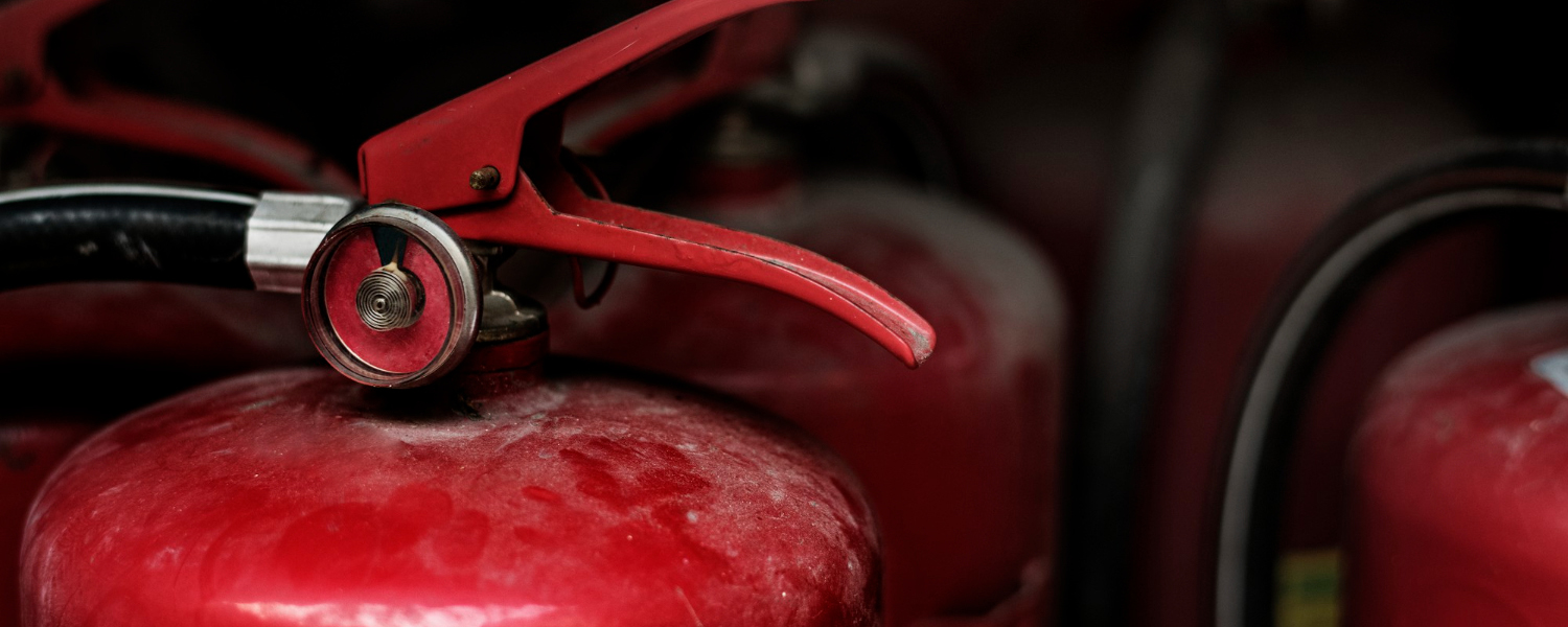 closeup-red-fire-extinguishers.jpg